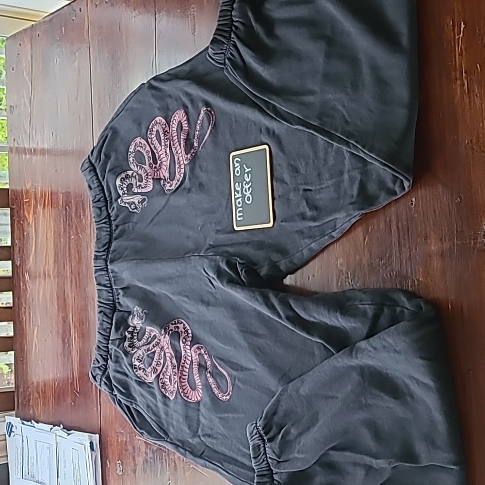 Like new sweats. Elastic waist and legs. Drawstring inside waist. 2 pockets